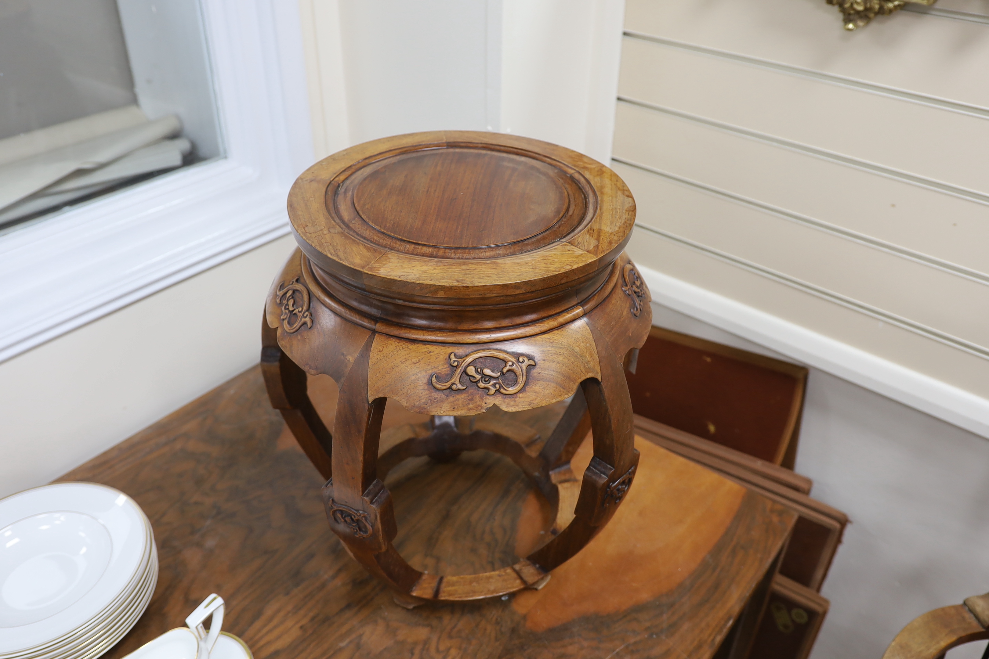 A Chinese hardwood jardiniere stand, in Ming style, diameter 40cm, height 45cm